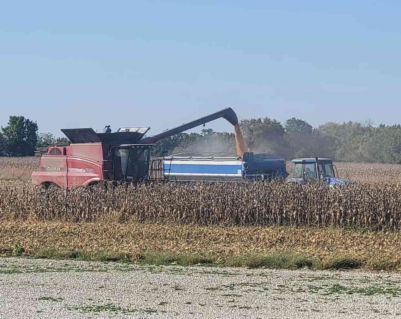 Combine unloading corn into a grain cart